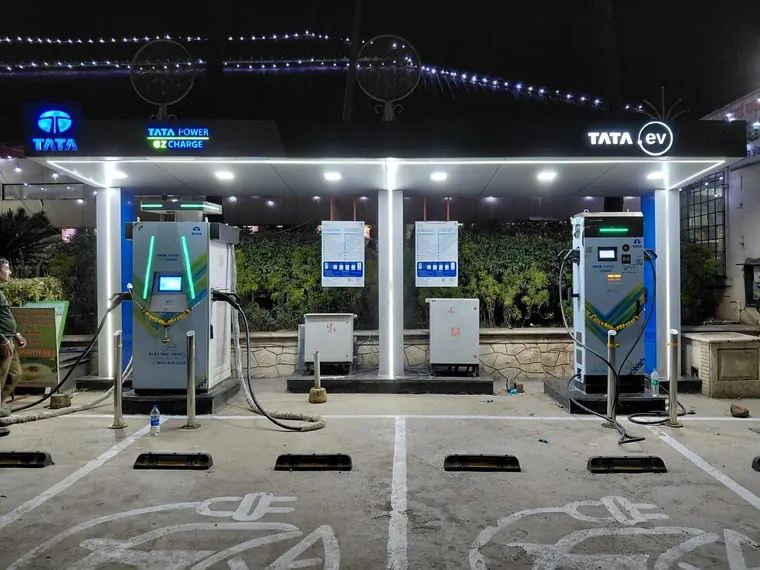 Two Tata Power EZ Charge fast chargers beneath a canopy